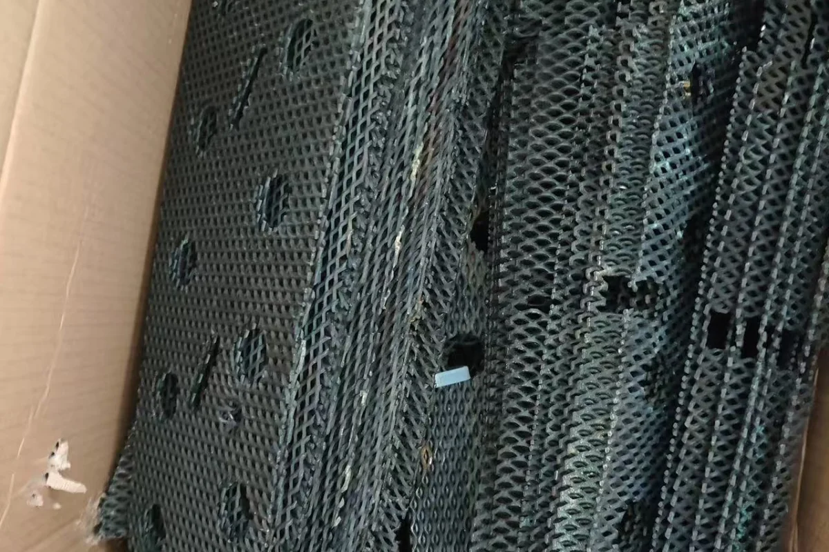 Bundled spent expanded titanium mesh from an industrial plating line